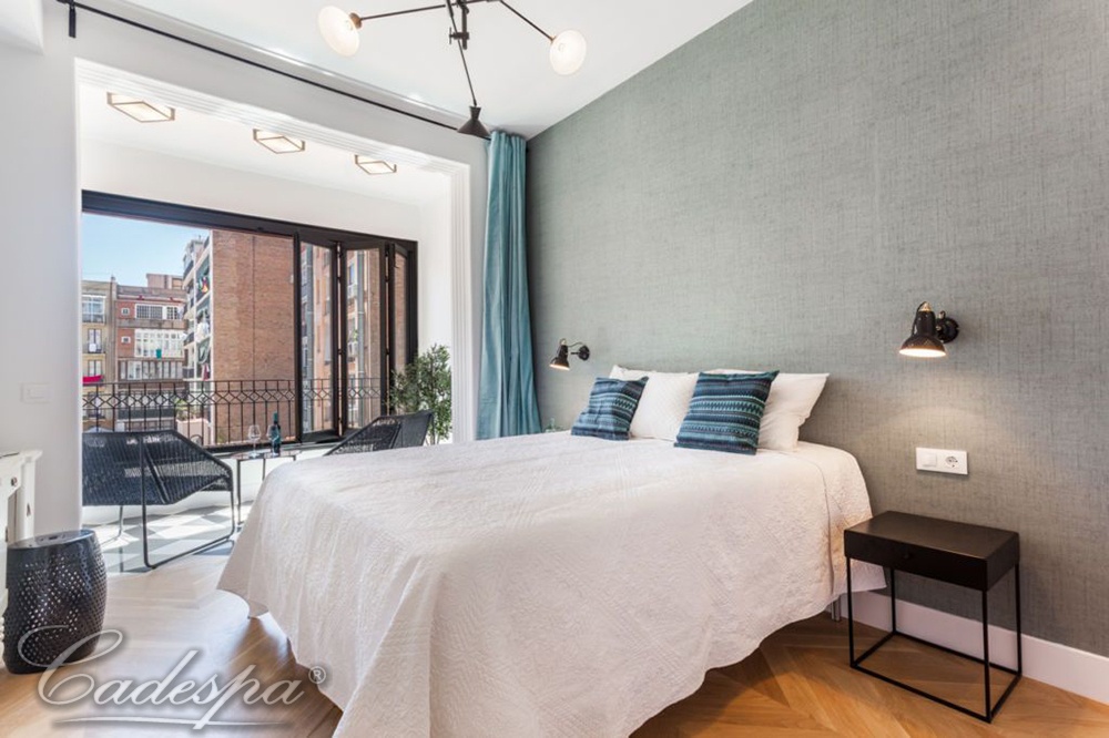 Квартира с тремя спальнями на одной из самых красивых улиц Барселоны. 